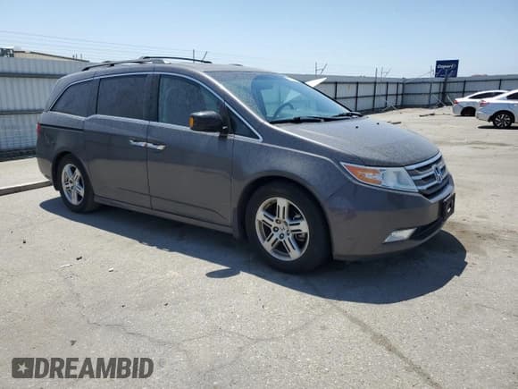 ✅ 2012 Honda Odyssey Touring • VIN: 5FNRL5H9XCB109229 • Lot: 59885895. Listed on Copart with 153,668 mi. Free auction sales archive from the USA and detailed vehicle history report at DreamBid. Image 4.