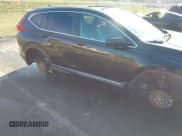 ✅ 2018 Honda CR-V Touring • VIN: 7FARW2H90JE052921 • Lot: 43671364. Listed on IAAI with 101,261 mi. Free auction sales archive from the USA and detailed vehicle history report at DreamBid. Image 17.