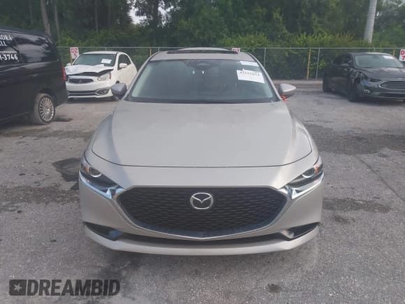 ✅ 2025 Mazda 3 S Preferred • VIN: JM1BPACM7S1774414 • Lot: 43215654. Listed on IAAI with 21,660 mi. Free auction sales archive from the USA and detailed vehicle history report at DreamBid. Image 12.