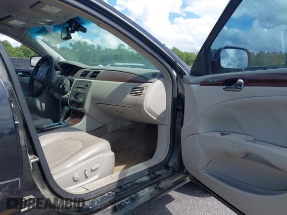 ✅ 2009 Buick Lucerne CXL • VIN: 1G4HD57MX9U127160 • Lot: 42222588. Listed on IAAI with 219,611 mi. Free auction sales archive from the USA and detailed vehicle history report at DreamBid. Image 5.