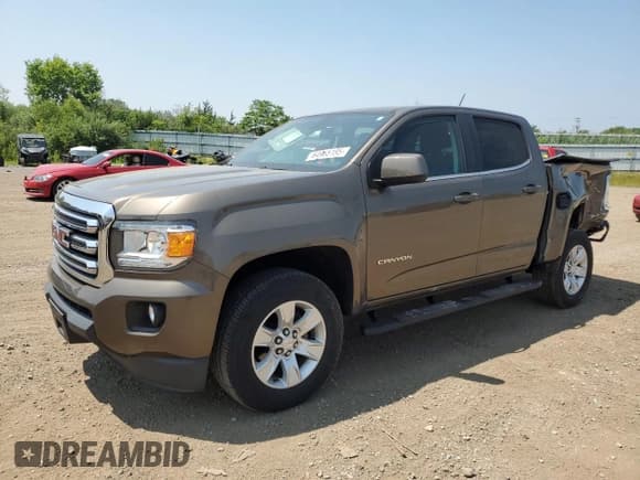 ✅ 2015 GMC Canyon 2WD SLE • VIN: 1GTG5BE32F1138155 • Lot: 64965195. Wystawiony na Copart z przebiegiem 77 566 mil. Bezpłatny archiwum sprzedaży aukcyjnych z USA i szczegółowy raport historii pojazdu na DreamBid. Zdjęcie 1.