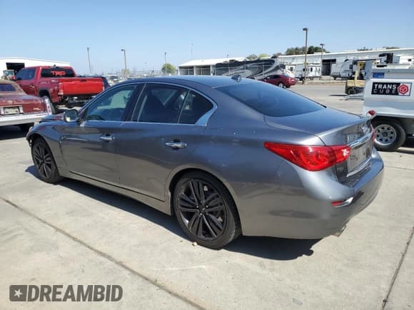 ✅ 2014 Infiniti Q50 Hybrid Premium • VIN: JN1AV7AP6EM690303 • Lot: 82169095. Listed on Copart with 139,620 mi. Free auction sales archive from the USA and detailed vehicle history report at DreamBid. Image 2.