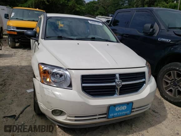 2007 Dodge Caliber SXT z VIN 1B3HB48B27D564683, wystawiony jako Copart lot #73495424 z przebiegiem 88 463 mil mil oraz Nie do naprawy • Non repairable. Historia ofert i sprzedaży dostępna na DreamBid. Obrazek 5.