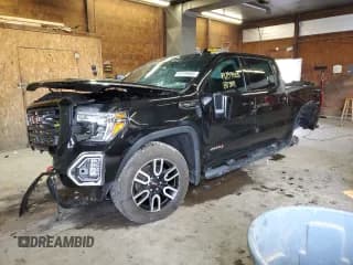 ✅ 2021 GMC Sierra 1500 AT4 • VIN: 3GTP9EED7MG399410 • Лот: 69789905. Опубликован ранее на Copart с пробегом 87 384 миль. Бесплатный доступ к архиву аукционных продаж из США и подробный отчёт об истории автомобиля на DreamBid. Изображение 1.