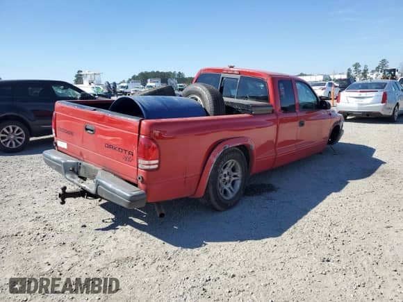 2004 Dodge Dakota z VIN 1D7GL12K34S504035, wystawiony jako Copart lot #46815725 z przebiegiem Nie podano mil oraz Szkoda całkowita • Salvage title. Historia ofert i sprzedaży dostępna na DreamBid. Obrazek 3.