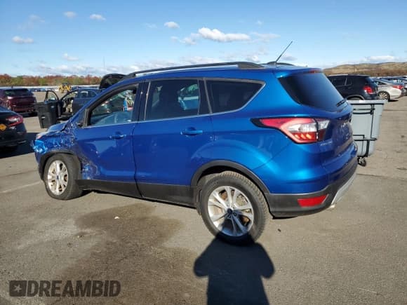 ✅ 2017 Ford Escape SE • VIN: 1FMCU9GD9HUE83194 • Lot: 91211475. Listed on Copart with 115,551 mi. Free auction sales archive from the USA and detailed vehicle history report at DreamBid. Image 2.