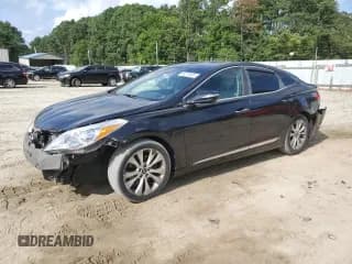 ✅ 2013 Hyundai Azera • VIN: KMHFG4JG4DA218415 • Лот: 68215905. Опубликован ранее на Copart с пробегом 117 988 миль. Бесплатный доступ к архиву аукционных продаж из США и подробный отчёт об истории автомобиля на DreamBid. Изображение 1.