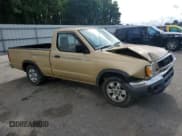 ✅ 1998 Nissan Frontier XE • VIN: 1N6DD21SXWC335532 • Lot: 65150225. Listed on Copart with 212,652 mi. Free auction sales archive from the USA and detailed vehicle history report at DreamBid. Image 4.