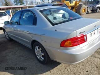 ✅ 2001 Kia Optima LX • VIN: KNAGD126115032175 • Лот: 41729589. Опубликован ранее на IAAI с пробегом 107 594 миль. Бесплатный доступ к архиву аукционных продаж из США и подробный отчёт об истории автомобиля на DreamBid. Изображение 3.