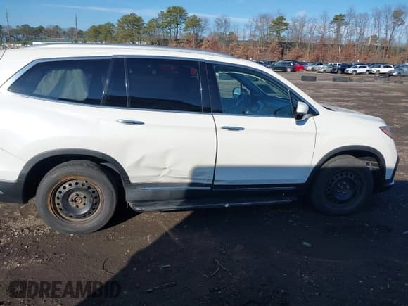 ✅ 2019 Honda Pilot Touring 8-Passenger • VIN: 5FNYF6H99KB024891 • Лот: 43838516. Опубликован ранее на IAAI с пробегом 82 711 миль. Бесплатный доступ к архиву аукционных продаж из США и подробный отчёт об истории автомобиля на DreamBid. Изображение 13.