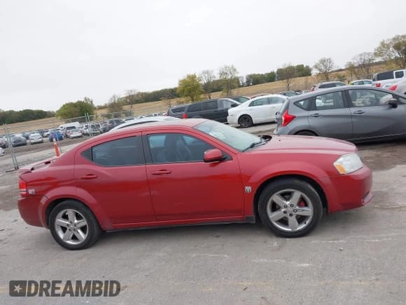 ✅ 2010 Dodge Avenger R/T • VIN: 1B3CC5FV1AN116592 • Lot: 43395324. Listed on IAAI with 157,482 mi. Free auction sales archive from the USA and detailed vehicle history report at DreamBid. Image 14.