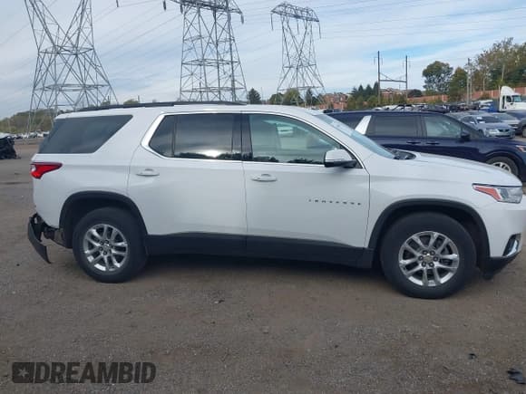 ✅ 2019 Chevrolet Traverse LT Cloth • VIN: 1GNEVGKW4KJ311095 • Lot: 43560491. Wystawiony na IAAI z przebiegiem 87 597 mil. Bezpłatny archiwum sprzedaży aukcyjnych z USA i szczegółowy raport historii pojazdu na DreamBid. Zdjęcie 14.