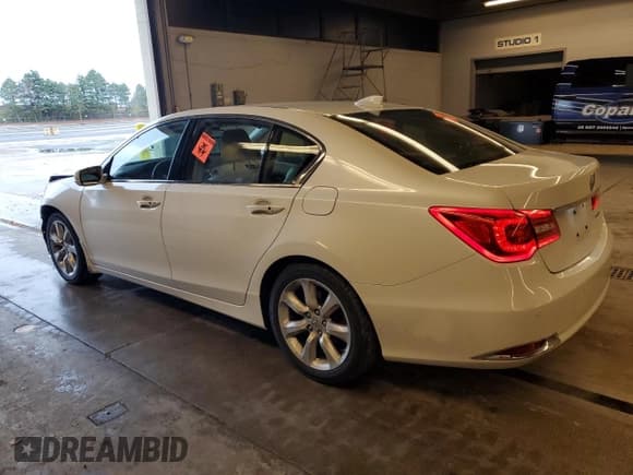 ✅ 2014 Acura RLX Advance • VIN: JH4KC1F96EC800303 • Lot: 79109624. Listed on Copart with 167,868 mi. Free auction sales archive from the USA and detailed vehicle history report at DreamBid. Image 2.