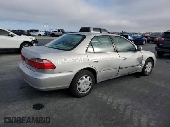 1999 Honda Accord LX z VIN 1HGCG6657XA150109, wystawiony jako Copart lot #85397155 z przebiegiem 132 685 mil mil oraz Szkoda całkowita • Salvage title. Historia ofert i sprzedaży dostępna na DreamBid. Obrazek 3.