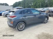 ✅ 2021 Hyundai Kona SEL • VIN: KM8K22AA1MU670351 • Лот: 65957645. Опубликован ранее на Copart с пробегом 127 312 миль. Бесплатный доступ к архиву аукционных продаж из США и подробный отчёт об истории автомобиля на DreamBid. Изображение 3.