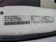 ✅ 2023 Chrysler Pacifica Hybrid Touring L • VIN: 2C4RC1L74PR558768 • Lot: 61407555. Listed on Copart with 70,387 mi. Free auction sales archive from the USA and detailed vehicle history report at DreamBid. Image 13.