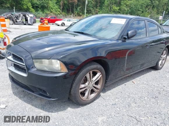 2012 Dodge Charger SXT Plus z VIN 2C3CDXJG3CH183873, wystawiony jako IAAI lot #42768967 z przebiegiem 257 873 mil mil oraz . Historia ofert i sprzedaży dostępna na DreamBid. Obrazek 2.