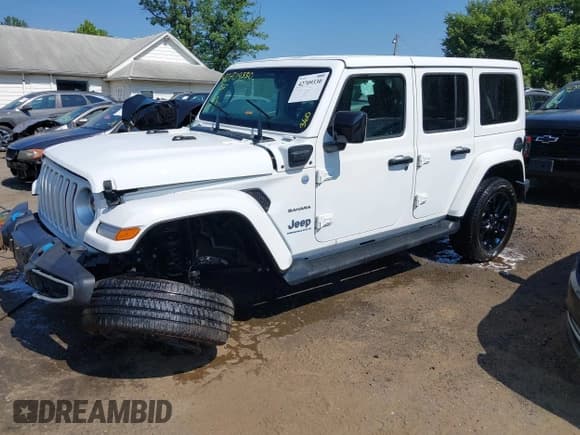 ✅ 2023 Jeep Wrangler Sahara • VIN: 1C4JJXP6XPW537180 • Lot: 42709330. Listed on IAAI with 31,251 mi. Free auction sales archive from the USA and detailed vehicle history report at DreamBid. Image 17.