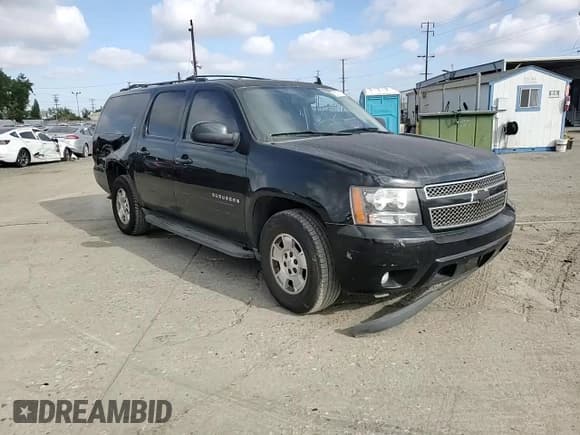 ✅ 2014 Chevrolet Suburban LT • VIN: 1GNSCJE00ER185661 • Лот: 82712675. Опубликован ранее на Copart с пробегом 101 363 миль. Бесплатный доступ к архиву аукционных продаж из США и подробный отчёт об истории автомобиля на DreamBid. Изображение 14.