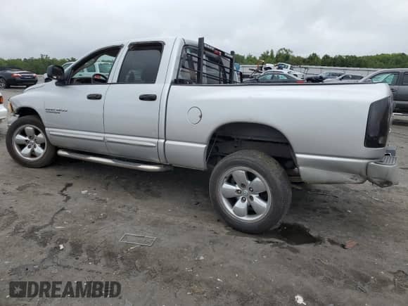 2005 Dodge 1500 SLT с VIN 1D7HA18NX5J605155, выставлен на аукционе Copart как лот 69599854 с пробегом 334 577 миль миль и Списание • Salvage title. История ставок и продаж доступна на DreamBid. Изображение 2.