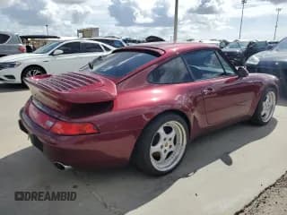 ✅ 1996 Porsche 911 • VIN: WP0AA2998TS321999 • Lot: 75216174. Wystawiony na Copart z przebiegiem 66 121 mil. Bezpłatny archiwum sprzedaży aukcyjnych z USA i szczegółowy raport historii pojazdu na DreamBid. Zdjęcie 3.