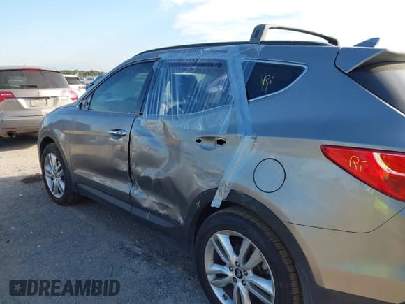 ✅ 2016 Hyundai Santa Fe • VIN: 5XYZW4LA8GG309060 • Лот: 43413819. Опубликован ранее на IAAI с пробегом 122 315 миль. Бесплатный доступ к архиву аукционных продаж из США и подробный отчёт об истории автомобиля на DreamBid. Изображение 6.