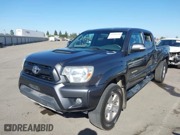 ✅ 2015 Toyota Tacoma PreRunner • VIN: 3TMKU4HN6FM044529 • Lot: 43031258. Listed on IAAI with 167,715 mi. Free auction sales archive from the USA and detailed vehicle history report at DreamBid. Image 2.