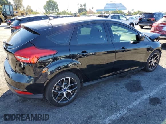 ✅ 2018 Ford Focus SEL • VIN: 1FADP3M22JL205125 • Лот: 92094185. Опубликован ранее на Copart с пробегом 95 253 миль. Бесплатный доступ к архиву аукционных продаж из США и подробный отчёт об истории автомобиля на DreamBid. Изображение 3.