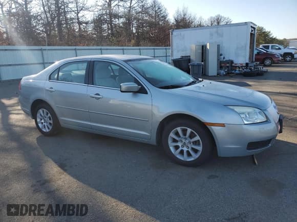 ✅ 2006 Mercury Milan • VIN: 3MEFM07146R666945 • Lot: 49838285. Listed on Copart with 70,493 mi. Free auction sales archive from the USA and detailed vehicle history report at DreamBid. Image 4.