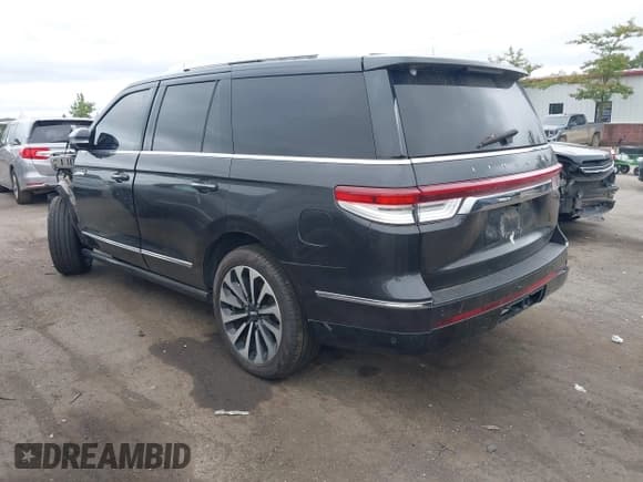 ✅ 2022 Lincoln Navigator Reserve • VIN: 5LMJJ2LT3NEL04266 • Lot: 43030668. Listed on IAAI with 27,797 mi. Free auction sales archive from the USA and detailed vehicle history report at DreamBid. Image 3.