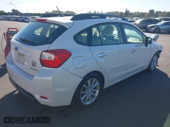 ✅ 2012 Subaru Impreza Premium • VIN: JF1GPAB61CH240431 • Lot: 43315187. Listed on IAAI with 76,218 mi. Free auction sales archive from the USA and detailed vehicle history report at DreamBid. Image 4.