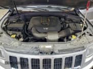 ✅ 2014 Jeep Grand Cherokee Limited • VIN: 1C4RJFBG1EC350745 • Lot: 94419295. Wystawiony na Copart z przebiegiem 142 122 mil. Bezpłatny archiwum sprzedaży aukcyjnych z USA i szczegółowy raport historii pojazdu na DreamBid. Zdjęcie 12.