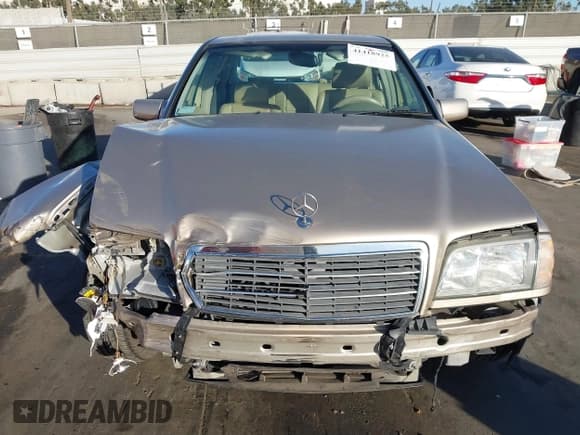 ✅ 2000 Mercedes-Benz C 230 Kompressor • VIN: WDBHA24G9YA856825 • Lot: 41418925. Wystawiony na IAAI z przebiegiem 99 616 mil. Bezpłatny archiwum sprzedaży aukcyjnych z USA i szczegółowy raport historii pojazdu na DreamBid. Zdjęcie 12.