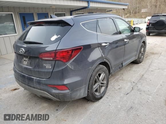 ✅ 2017 Hyundai Santa Fe 2.4L • VIN: 5XYZUDLB4HG488343 • Lot: 67198472. Listed on Copart with Not provided. Free auction sales archive from the USA and detailed vehicle history report at DreamBid. Image 4.
