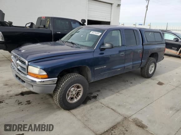✅ 2002 Dodge Dakota SLT • VIN: 1B7HG48N32S720700 • Lot: 80234494. Wystawiony na Copart z przebiegiem 207 035 mil. Bezpłatny archiwum sprzedaży aukcyjnych z USA i szczegółowy raport historii pojazdu na DreamBid. Zdjęcie 1.
