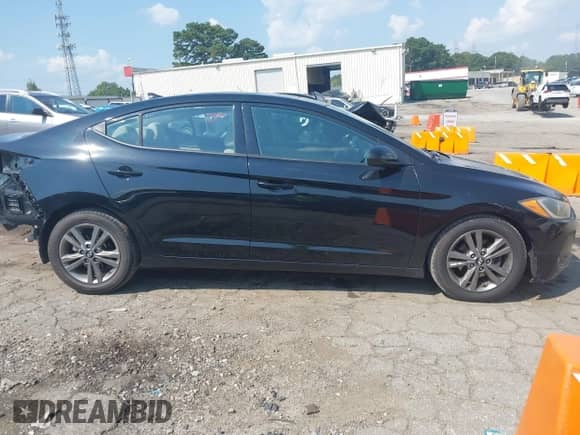 2018 Hyundai Elantra Value Edition z VIN 5NPD84LF3JH220108, wystawiony jako IAAI lot #43124055 z przebiegiem 54 805 mil mil oraz . Historia ofert i sprzedaży dostępna na DreamBid. Obrazek 14.