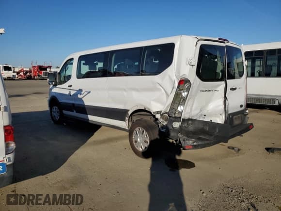 ✅ 2020 Ford Transit Passenger XL • VIN: 1FBAX2Y86LKA24158 • Lot: 84503734. Listed on Copart with 142,051 mi. Free auction sales archive from the USA and detailed vehicle history report at DreamBid. Image 2.