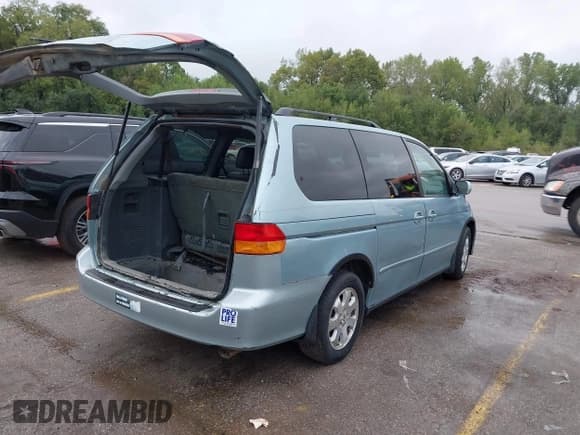 ✅ 2004 Honda Odyssey EX-L • VIN: 5FNRL18014B065259 • Lot: 43287370. Listed on IAAI with 241,846 mi. Free auction sales archive from the USA and detailed vehicle history report at DreamBid. Image 4.