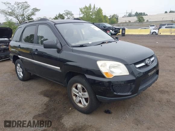 ✅ 2009 Kia Sportage EX • VIN: KNDJF723X97636531 • Лот: 43293955. Опубликован ранее на IAAI с пробегом 82 016 миль. Бесплатный доступ к архиву аукционных продаж из США и подробный отчёт об истории автомобиля на DreamBid. Изображение 1.