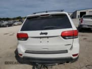 ✅ 2015 Jeep Grand Cherokee Laredo • VIN: 1C4RJEAG1FC669883 • Lot: 85857515. Listed on Copart with 228,860 mi. Free auction sales archive from the USA and detailed vehicle history report at DreamBid. Image 6.