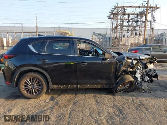 ✅ 2020 Mazda CX-5 Touring • VIN: JM3KFACMXL0730067 • Lot: 43210444. Wystawiony na IAAI z przebiegiem 92 800 mil. Bezpłatny archiwum sprzedaży aukcyjnych z USA i szczegółowy raport historii pojazdu na DreamBid. Zdjęcie 13.