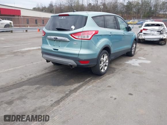 ✅ 2013 Ford Escape SEL • VIN: 1FMCU9HX1DUC32138 • Lot: 41864067. Listed on IAAI with 183,725 mi. Free auction sales archive from the USA and detailed vehicle history report at DreamBid. Image 4.