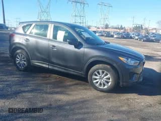 ✅ 2015 Mazda CX-5 Sport • VIN: JM3KE4BY6F0499357 • Lot: 43817789. Listed on IAAI with 155,042 mi. Free auction sales archive from the USA and detailed vehicle history report at DreamBid. Image 1.