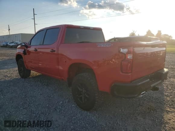 ✅ 2022 Chevrolet Silverado 1500 LT Trail Boss • VIN: 3GCUDFED0NG658781 • Lot: 74665864. Wystawiony na Copart z przebiegiem 13 963 mil. Bezpłatny archiwum sprzedaży aukcyjnych z USA i szczegółowy raport historii pojazdu na DreamBid. Zdjęcie 2.