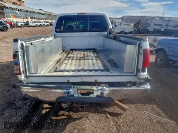 ✅ 2002 Ford F-350 XL • VIN: 1FTSW31F42EA76712 • Lot: 93949185. Listed on Copart with Not provided. Free auction sales archive from the USA and detailed vehicle history report at DreamBid. Image 6.