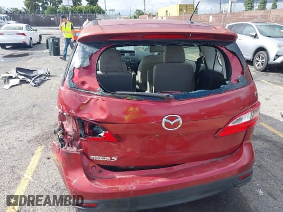 ✅ 2013 Mazda 5 Touring • VIN: JM1CW2CL6D0149807 • Lot: 43745505. Listed on IAAI with 162,227 mi. Free auction sales archive from the USA and detailed vehicle history report at DreamBid. Image 6.