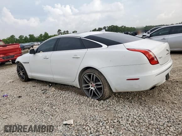 ✅ 2015 Jaguar XJ Portfolio • VIN: SAJWA2GZ3F8V86034 • Lot: 60227185. Listed on Copart with 67,886 mi. Free auction sales archive from the USA and detailed vehicle history report at DreamBid. Image 2.