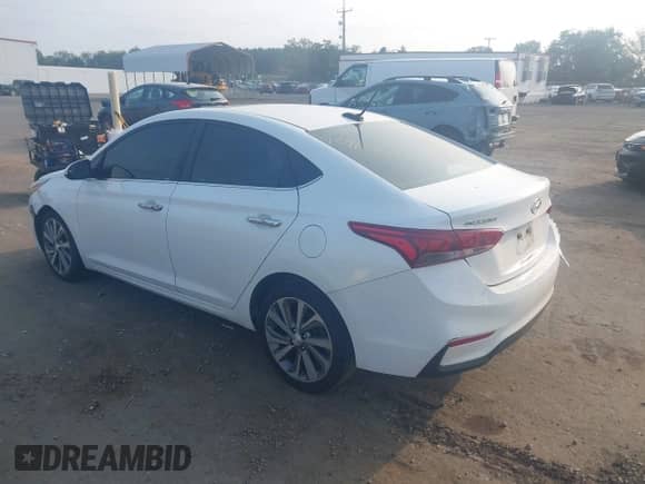 2022 Hyundai Accent Limited z VIN 3KPC34A68NE189848, wystawiony jako IAAI lot #42918785 z przebiegiem 52 491 mil mil oraz . Historia ofert i sprzedaży dostępna na DreamBid. Obrazek 3.