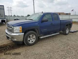 2013 Chevrolet Silverado 1500 LT with VIN 1GCRKSE7XDZ262242, listed as a Copart auction lot 71187465 with 133,097 mi miles and Salvage title. Bid and sale history available at DreamBid. Image 1.