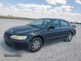 1999 Honda Accord LX z VIN JHMCG5644XC004088, wystawiony jako Copart lot #84821185 z przebiegiem 150 948 mil mil oraz Szkoda całkowita • Salvage title. Historia ofert i sprzedaży dostępna na DreamBid. Obrazek 1.